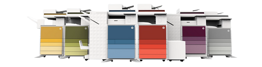 A group of printers of different colors are lined up in a row.