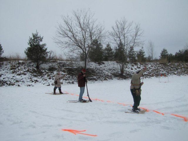 people at winter firing range practicing