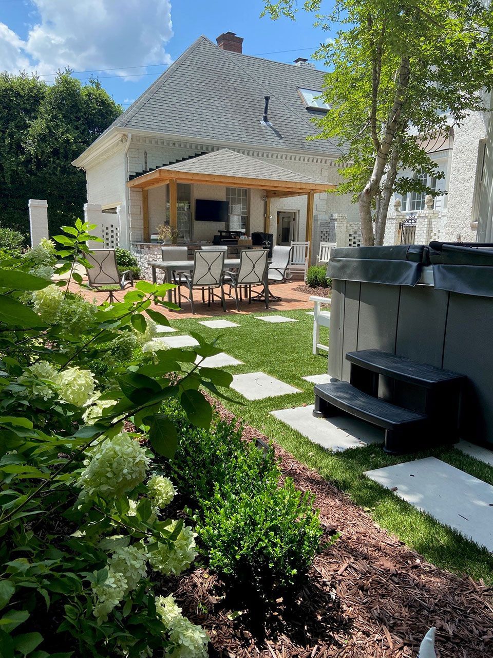 Backyard flower garden install from Brookscapes LLC serving Apex, Raleigh, and Wake Forest NC