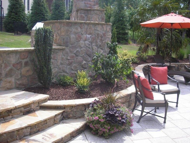 Landscape installation of garden in retainer wall from Brookscapes LLC Serving Wake Forest, Raleigh, and Wake Forest NC
