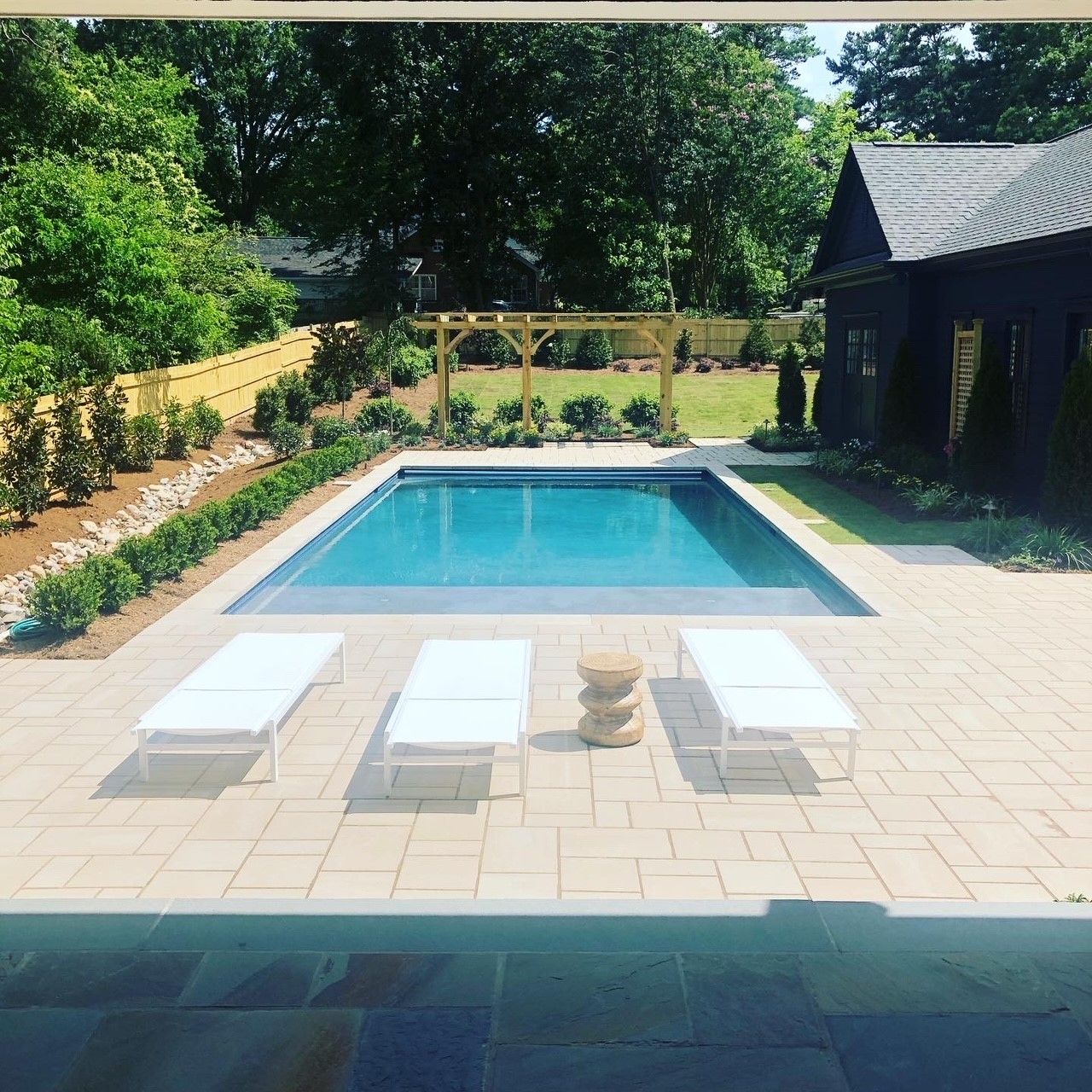 Landscape services surrounding in ground pool from Brookscapes LLC serving Apex, Raleigh, and Wake Forest NC