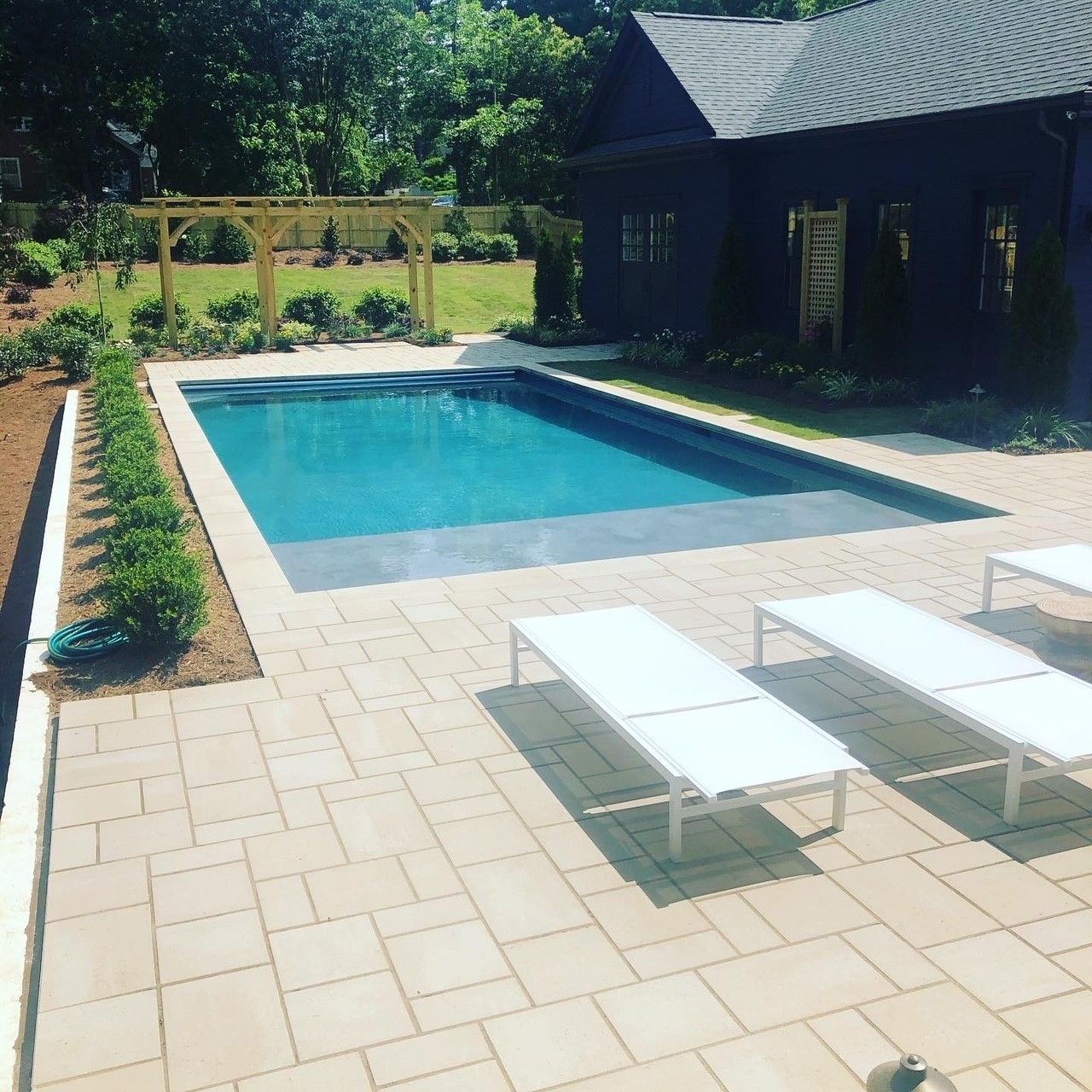 Landscape contract work surrounding in ground pool from Brookscapes LLC serving Apex, Raleigh, and Wake Forest NC