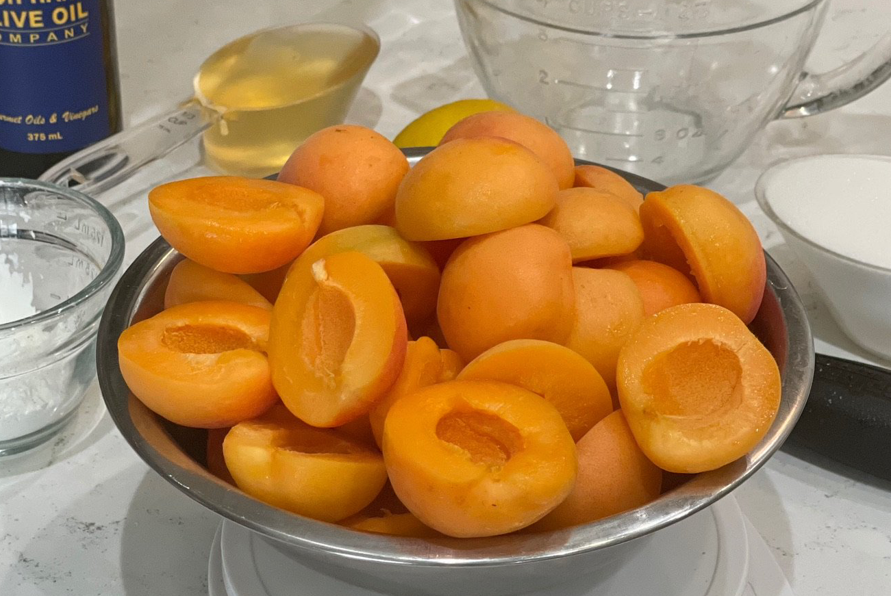 Bowl of Apricots cut in half.