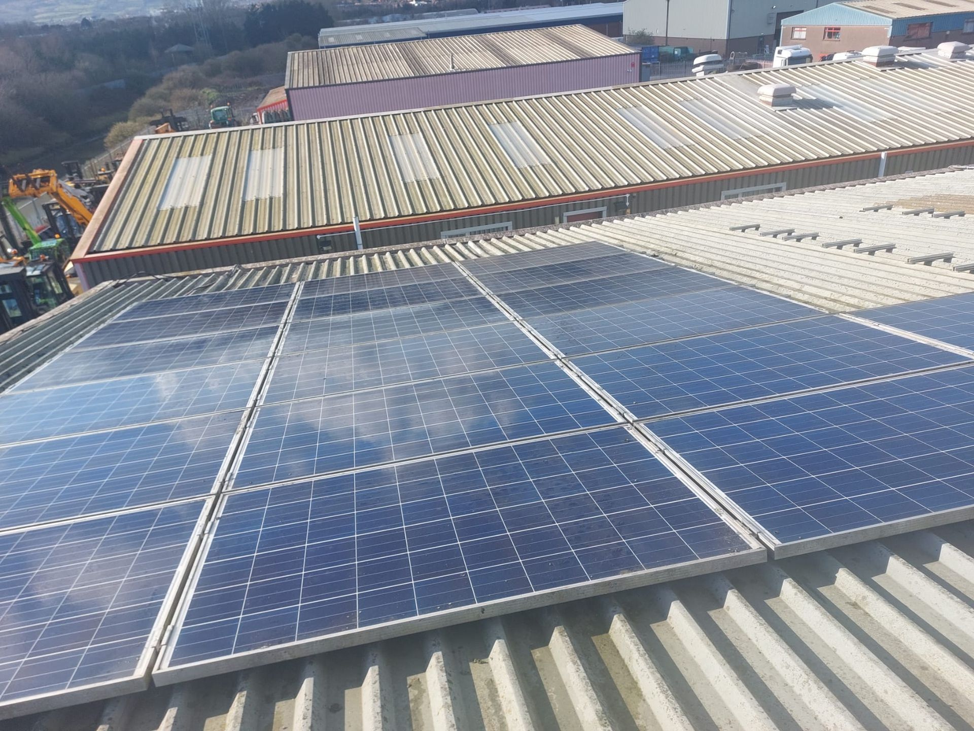 A roof with a lot of solar panels on it
