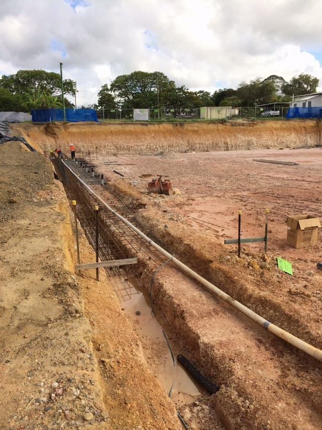 A Construction Site With A Trench And Piping — Vacuum Excavation in Moreton Bay, QLD