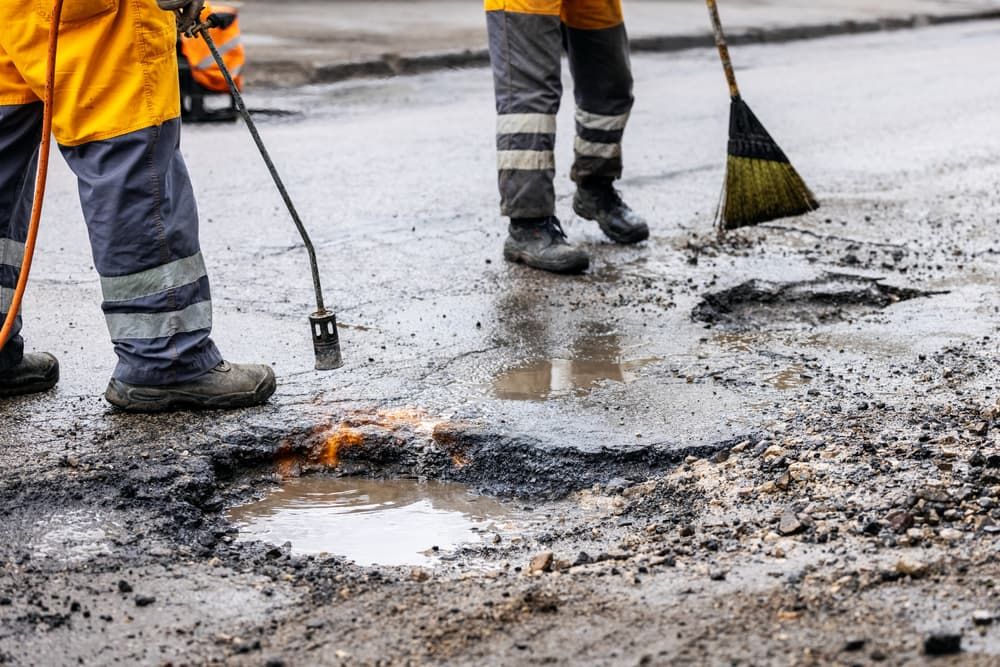 Group Of Workers Filling Potholes — Hydro Excavation on the Sunshine Coast, QLD