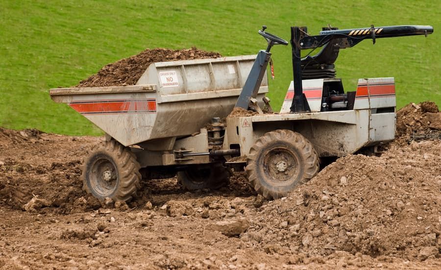 A Tractor With a Loader — Hydro Excavation on the Sunshine Coast, QLD