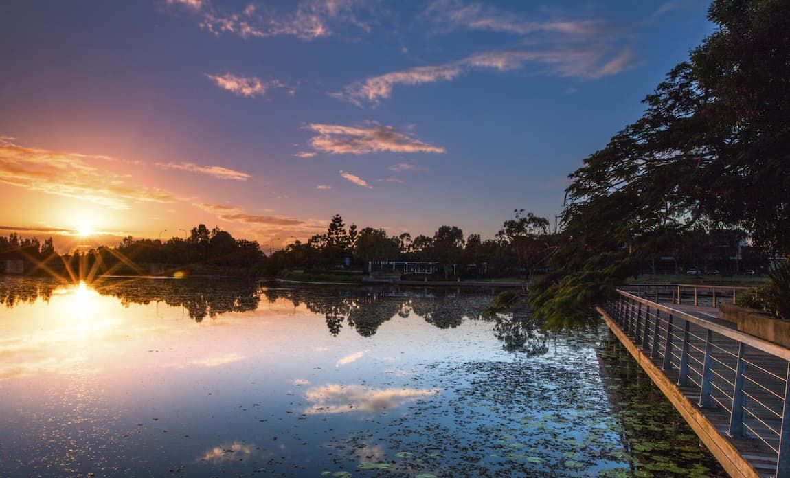 Sun Setting Over Lake Eden, North Lakes — Hydro Excavation Near Me in South East QLD