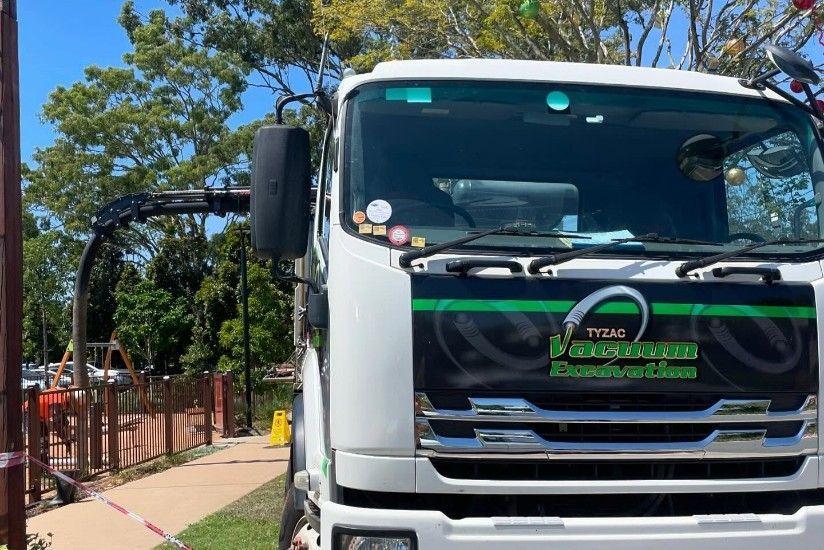 A Truck Doing Vacuum Excavation On The Ground