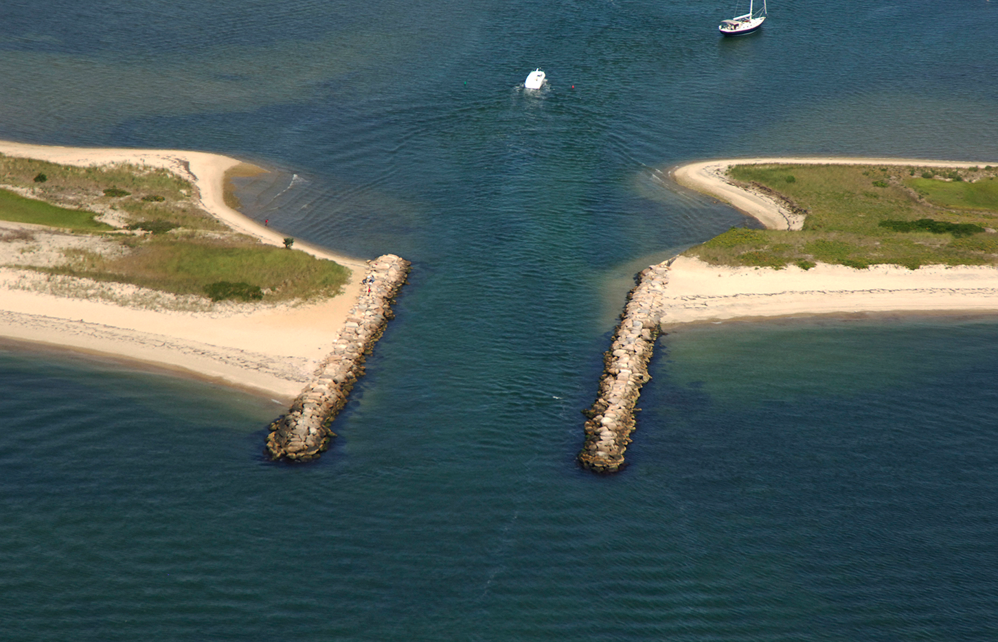 An aerial view of a small island in the middle of a body of water