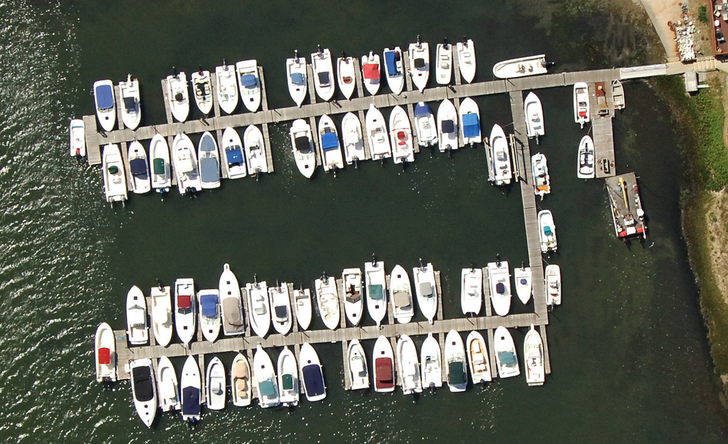 An aerial view of boats docked in a marina