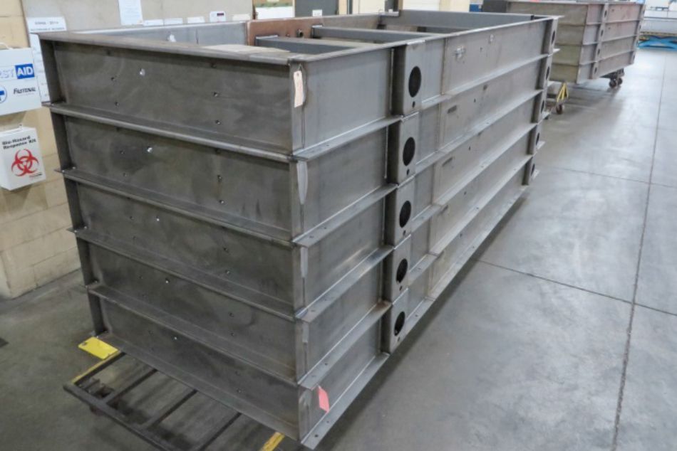 Heavy-duty base frame fabricated by United Alloy for industrial equipment.