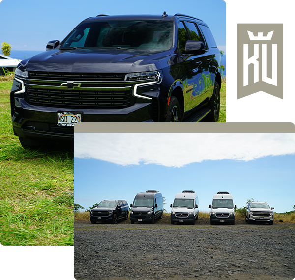 A chevrolet suv is parked next to a row of vans