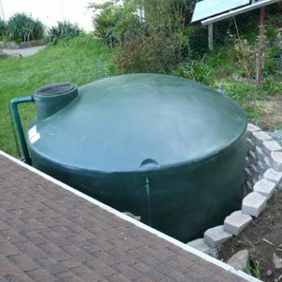Green Water Tank — Redding, CA — Dino’s Rain Gutters