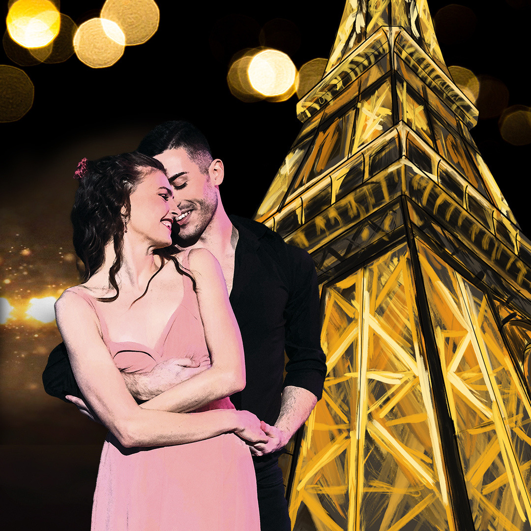 a man and woman are hugging in front of the eiffel tower