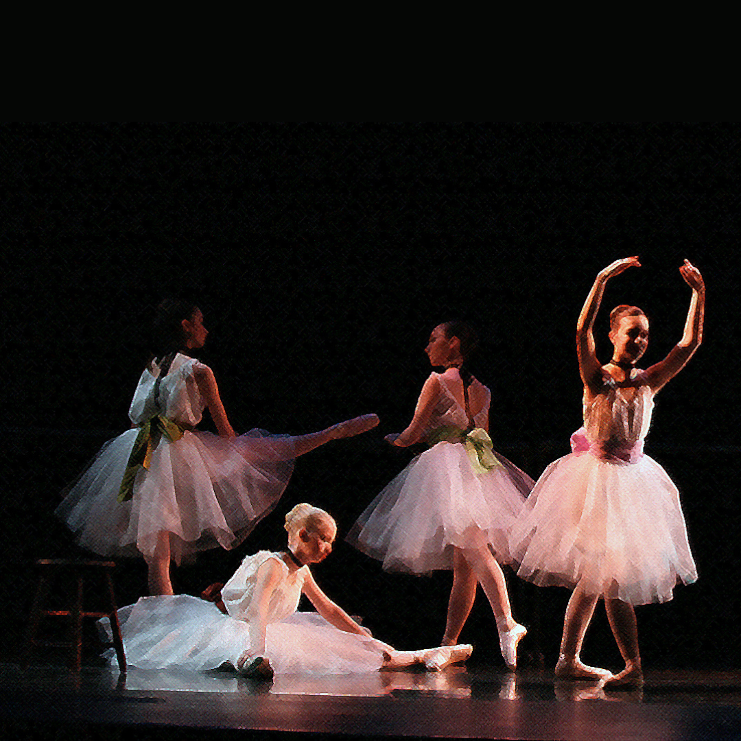 a group of ballerinas are performing on a stage