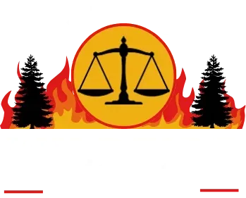 A scale of justice in a circle with trees and fire in the background.