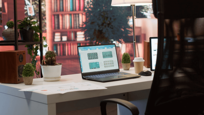 Empty home office setup showing documents-laptop from Freepik