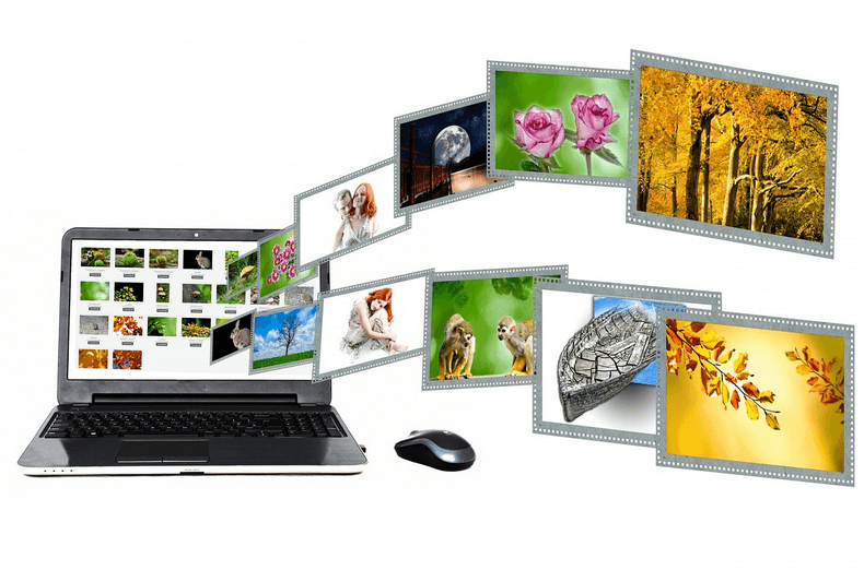 Laptop showing images and videos from Pixabay