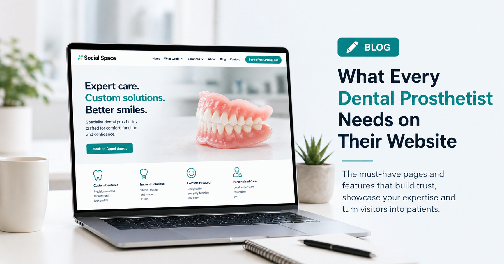 Laptop displaying dental prosthesis website with pink dentures and blog headline on a white desk