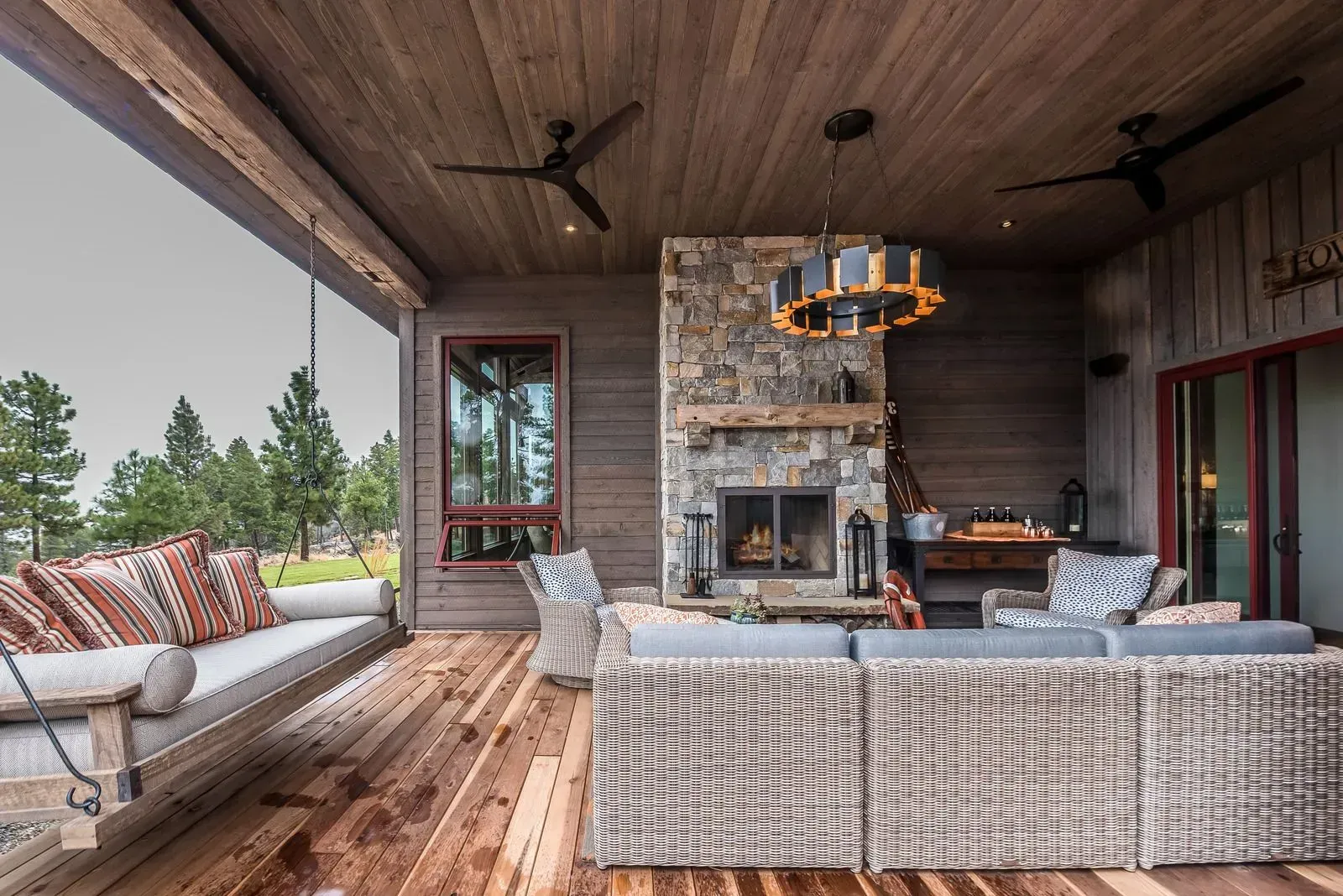 There is a fireplace in the middle of the living room.
