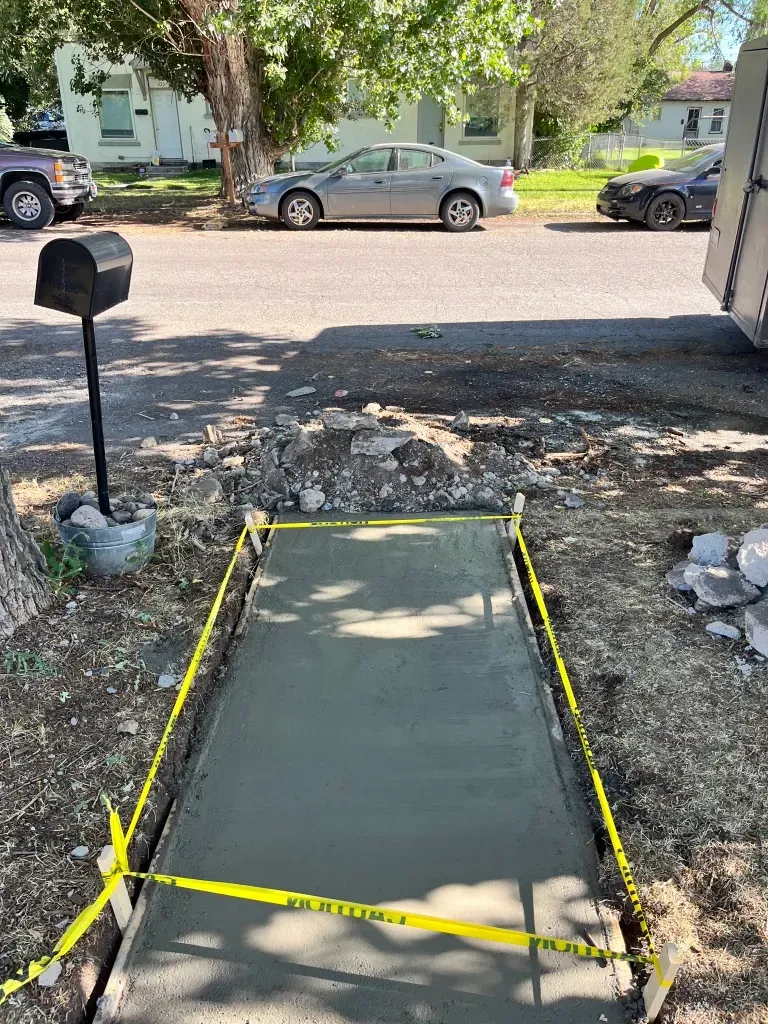 freshly poured concrete sidewalk