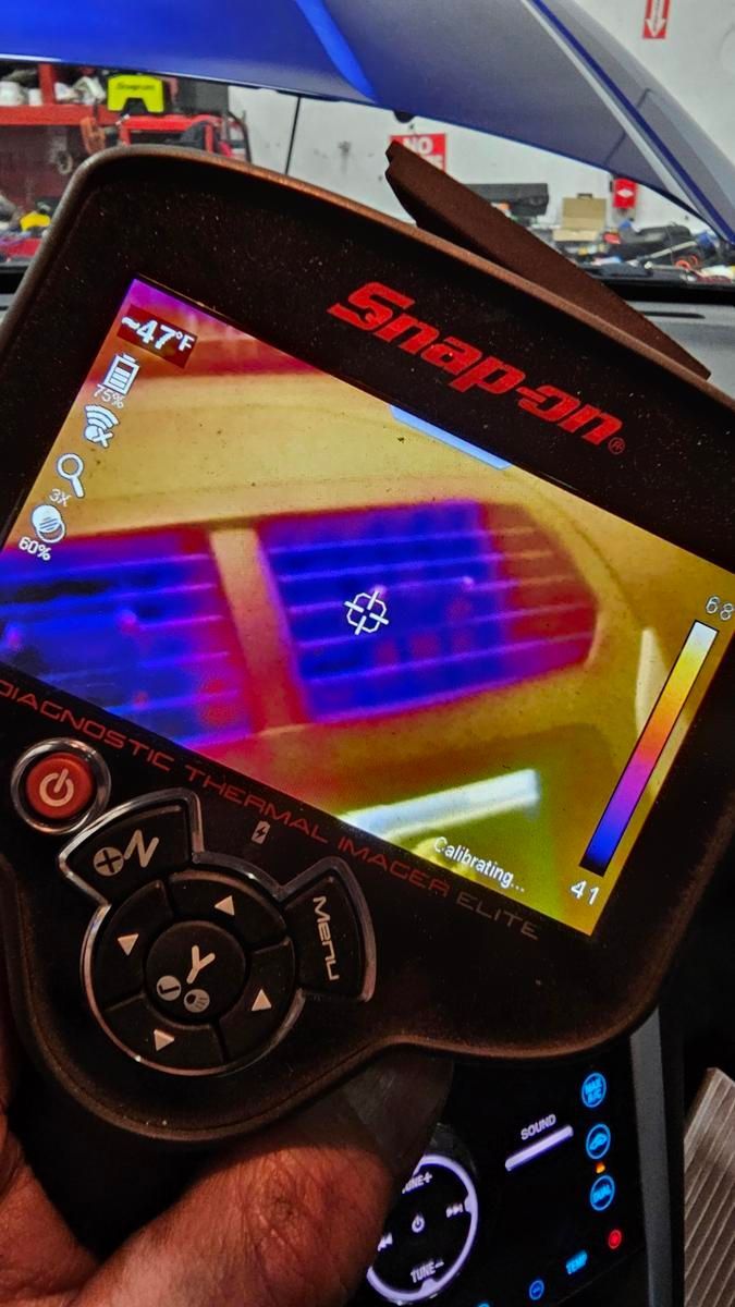 Thermal image of car's air conditioning vent, showing cold areas in blue and warm areas in yellow, taken by a Snap-on thermal imager. | Accomplished Automotive