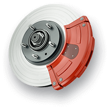Red brake caliper clamping a silver brake rotor.