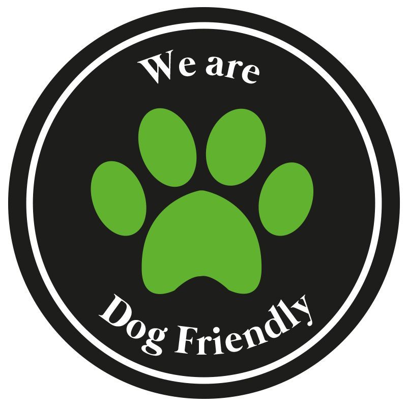 Dog friendly logo with green paw mark on black background