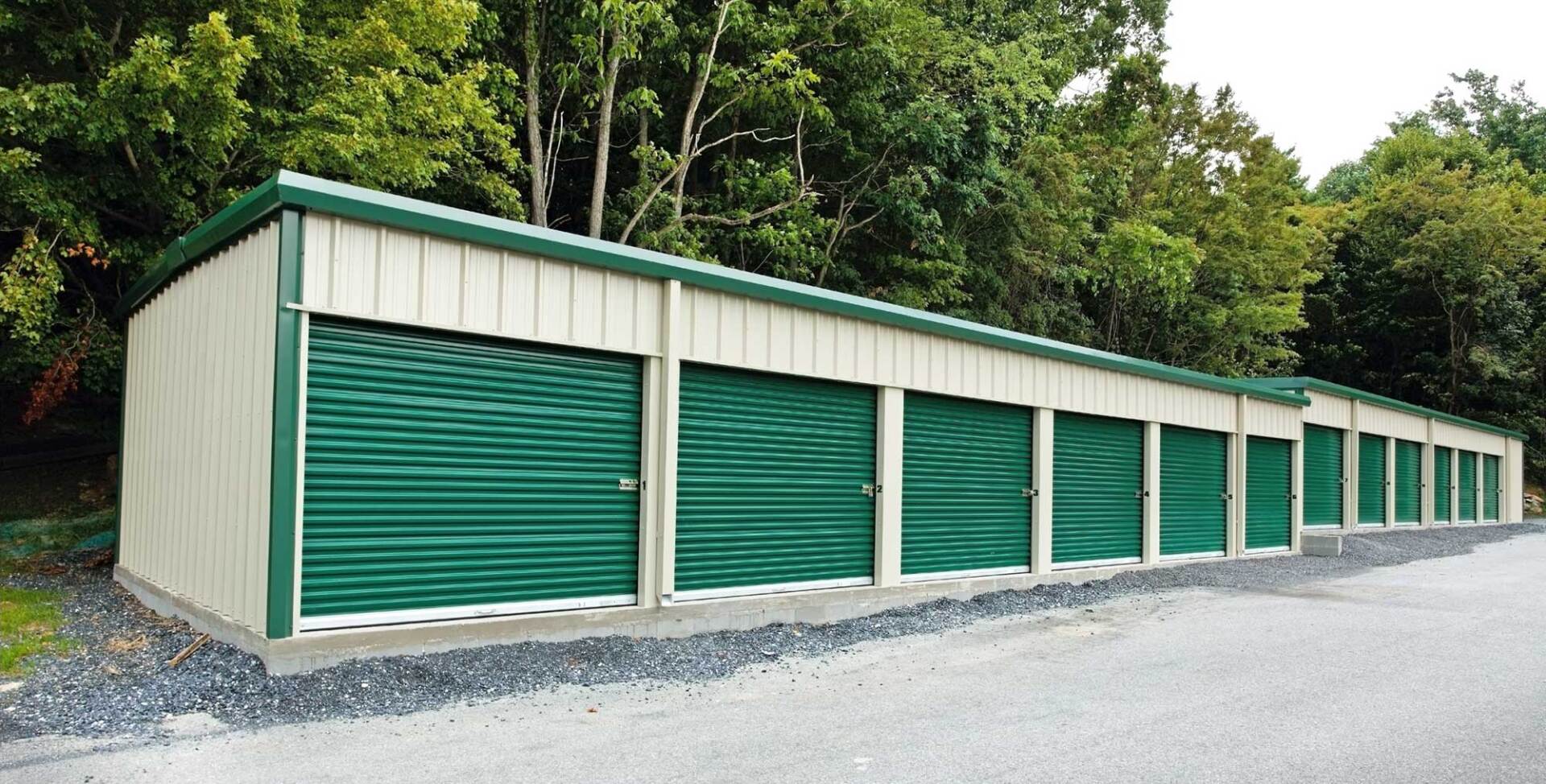 Row of Self Storage Units with Green Rolling Doors — Corpus Christi, TX — Crosstown Mini Storage