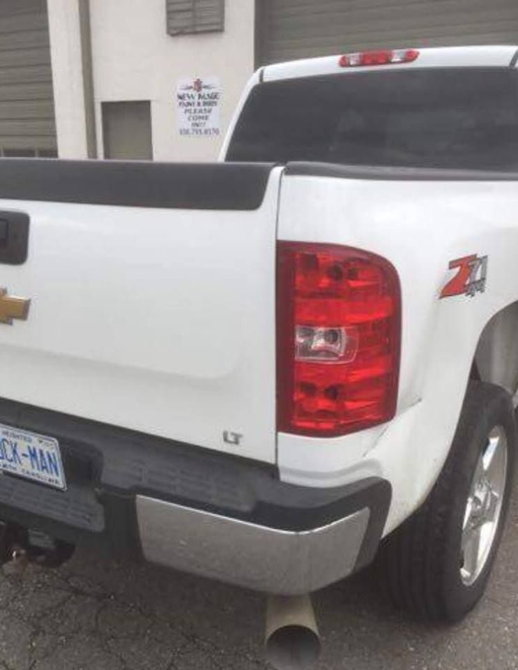 White Chevrolet Silverado pickup truck with a Z71 badge, license plate 