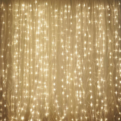 A curtain with a lot of lights on it.