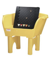 A yellow plastic chair with a black board on top of it.