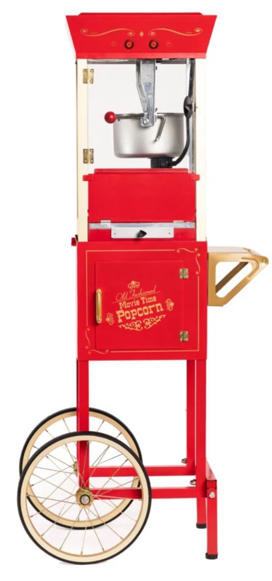 A red popcorn machine with wheels on a white background.