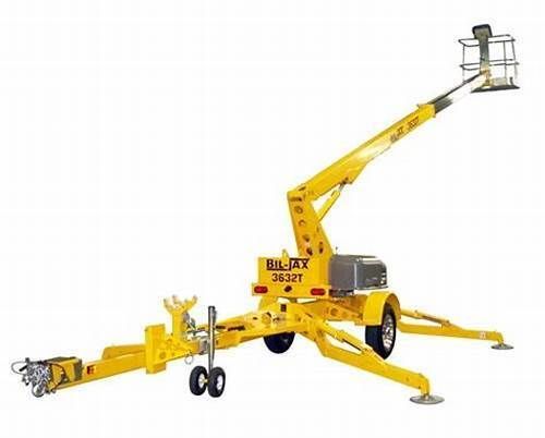 A yellow trailer with a crane attached to it