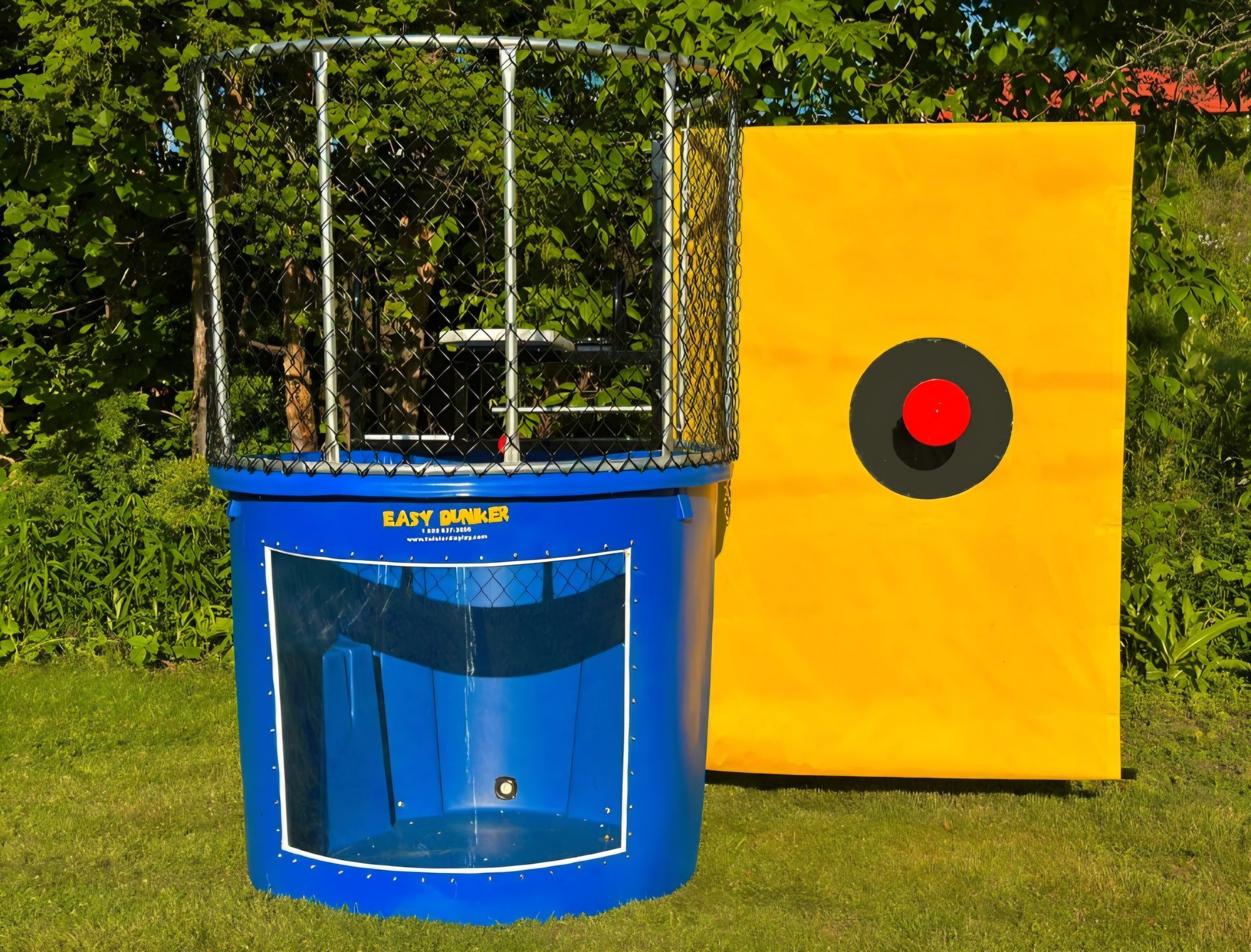A blue water bucket is next to a yellow target