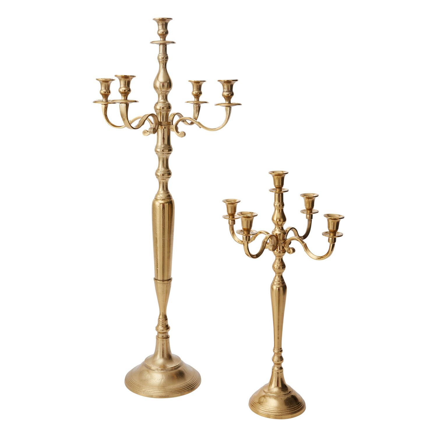 Two gold candelabra are sitting next to each other on a white background.
