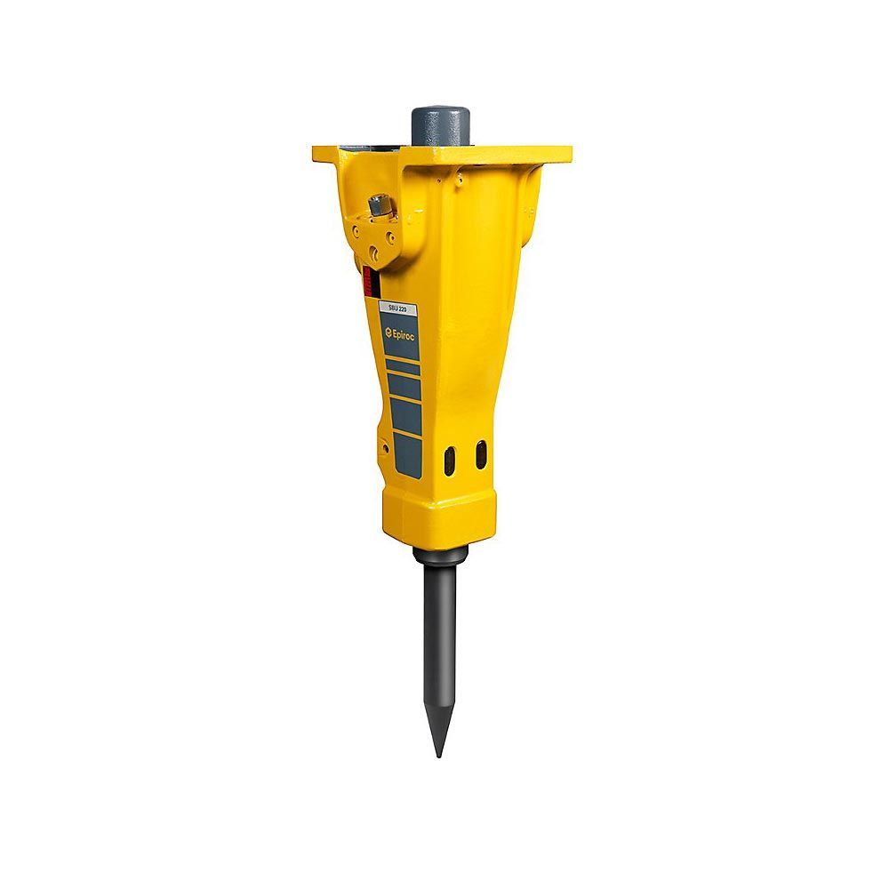 A yellow hydraulic hammer is sitting on top of a white surface.