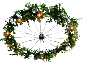 A wreath with leaves and lights around a bicycle wheel