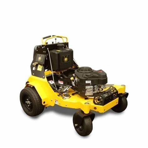 A yellow lawn mower is sitting on a white surface.