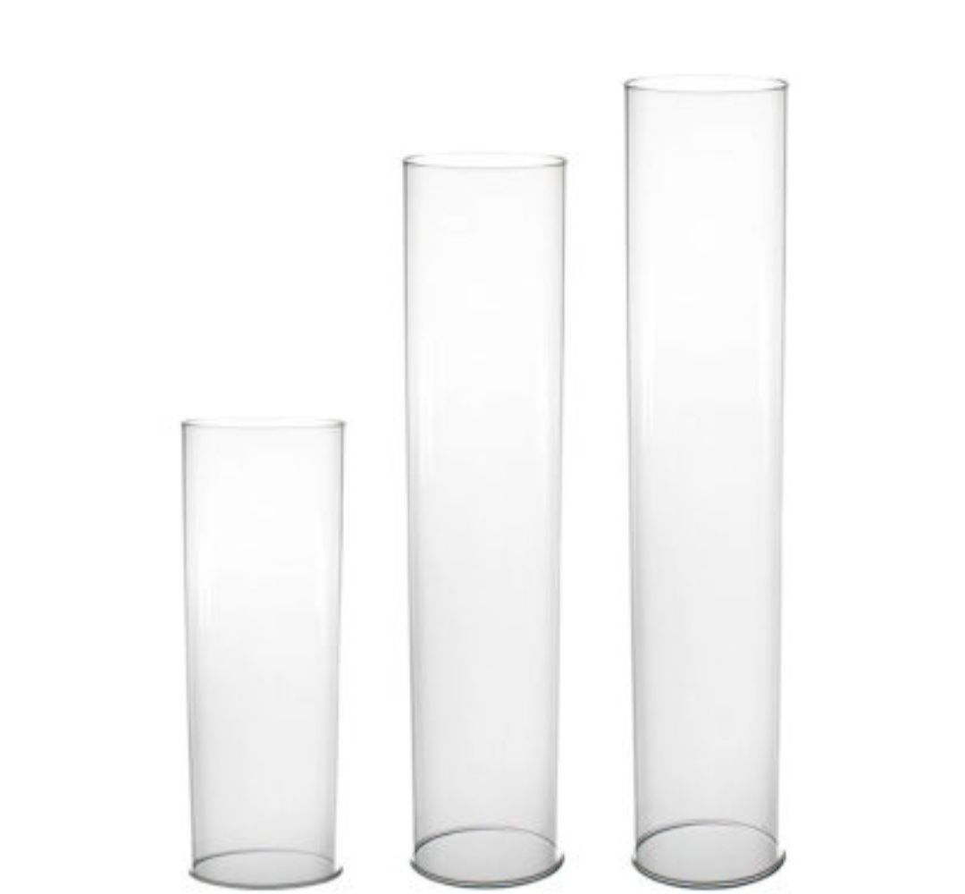 Three clear glass cylinders of different sizes on a white background.