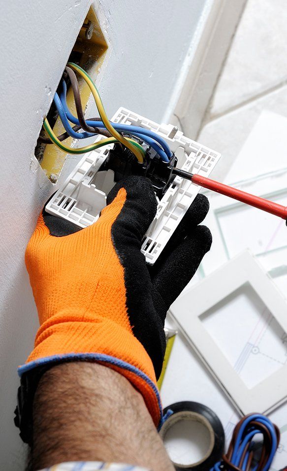 Electrician Fixing Plug — 1 Electrical & Air Conditioning in Lake Munmorah, NSW