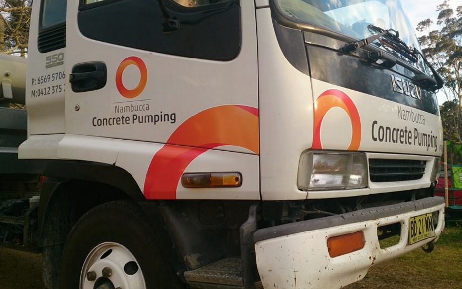 White Isuzu Concrete Pumping Truck With Orange and Red Logo — Nambucca Concrete Pumping in Nambucca Heads, NSW