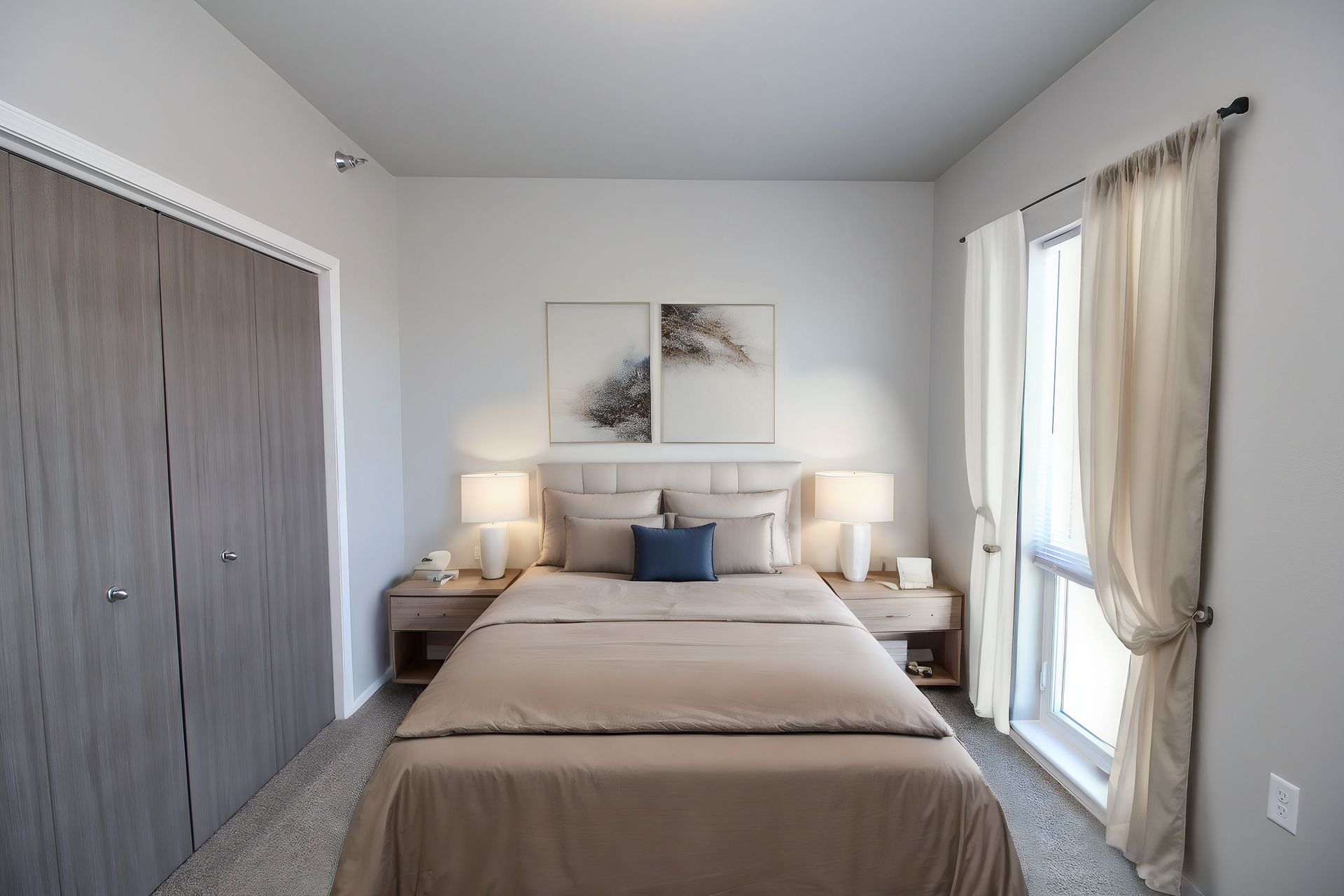 Bright bedroom with a made bed, bedside lamps, closet doors, and curtains by a large window.