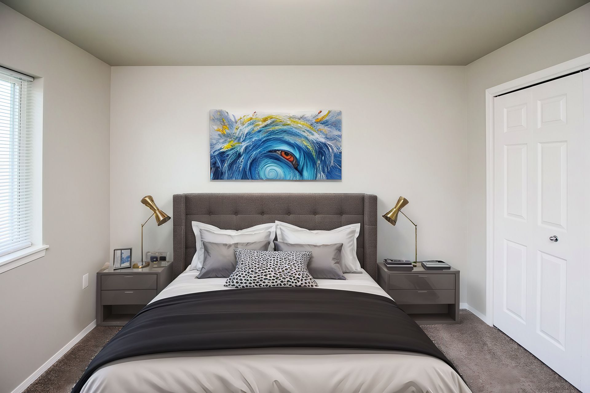 Neatly made bedroom with gray bed, nightstands, blue abstract art, and a white closet.