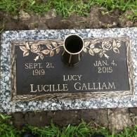 Bronze memorial plaque on a granite base for Lucille Galliam, born Sept. 21, 1919, died Jan. 4, 2015, with a central vase.