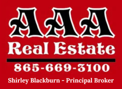 AAA Real Estate logo on red background with phone number 865-669-3100