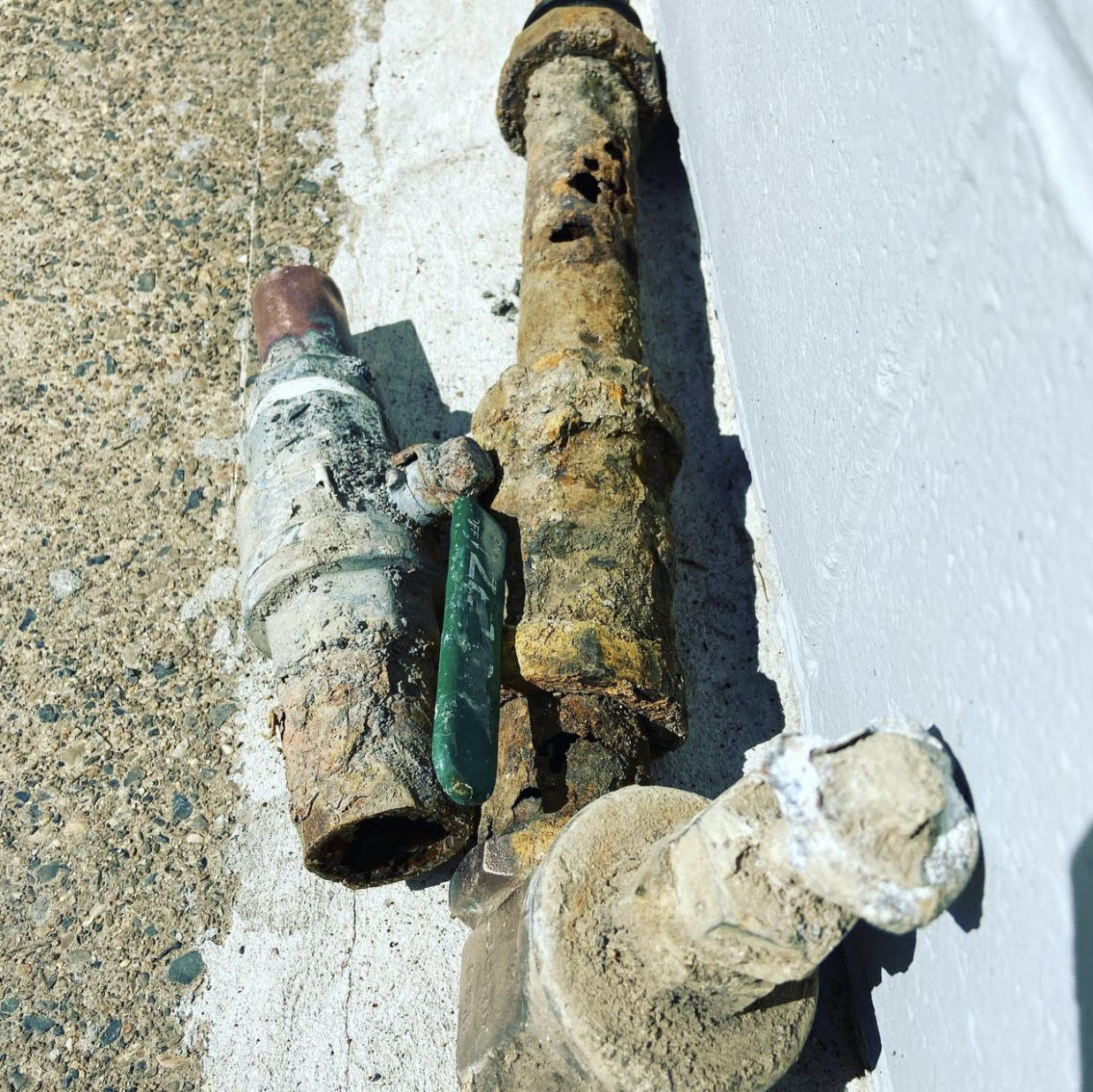 corroded old water main leaking water which need to be replaced by Jetty plumbing