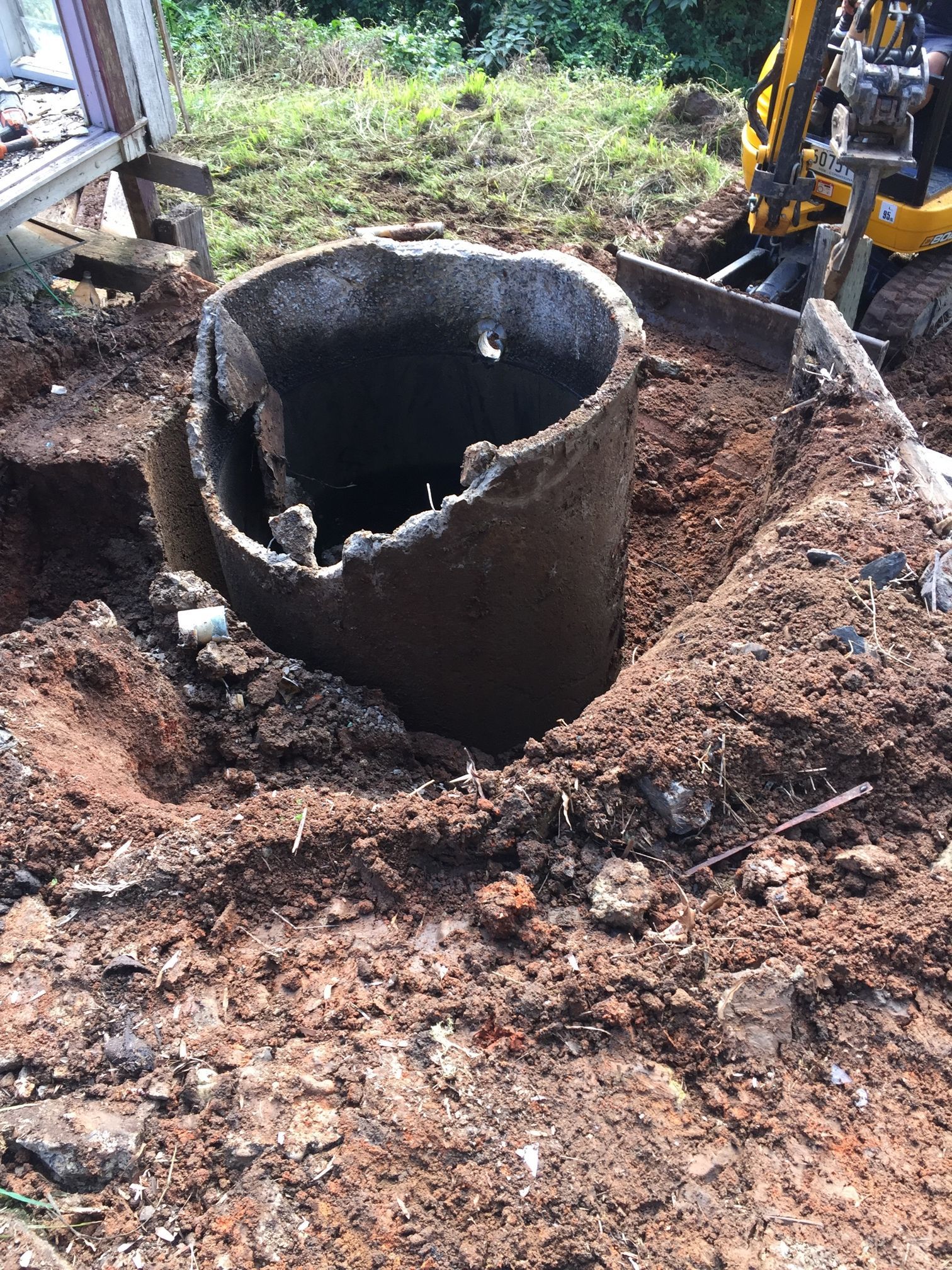 An old broken traditional septic wastewater System in Coffs Harbour