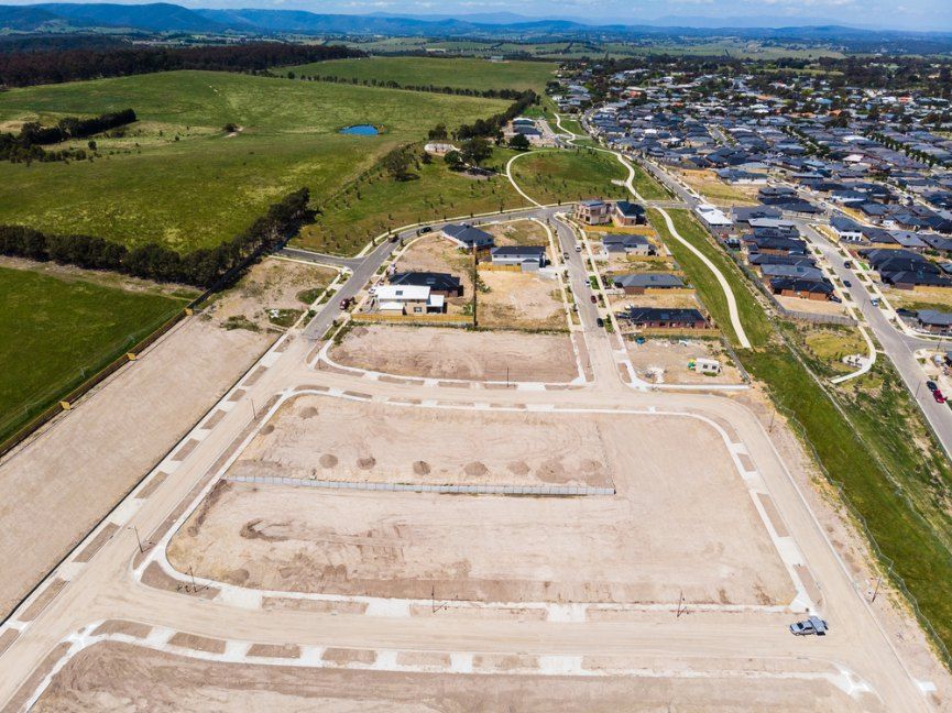 An Aerial View of a Residential Area With Lots of Dirt and Houses — Bennettron Demex in Grafton, NSW